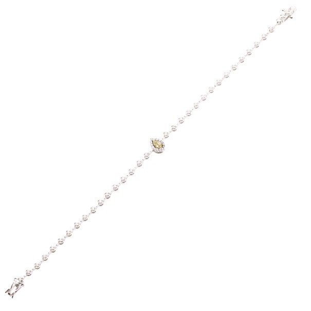 Pulseira em Ouro branco 18k Riviera 18cm com 49 Diamantes de 0.57CTS com 1 Diamante Fancy Yellow de 0.18 CTS