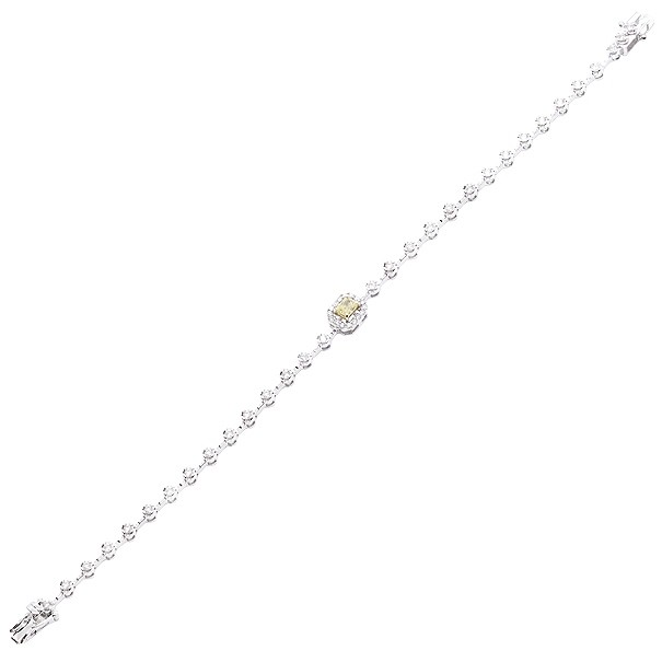 Pulseira em Ouro branco 18K branca 16 centímetros riviera com 47 diamantes de 0.55 quilates com 1 diamante fancy yellow de 0.20 quilates