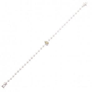 Pulseira em Ouro branco 18k Riviera 18cm com 49 Diamantes de 0.57CTS com 1 Diamante Fancy Yellow de 0.18 CTS